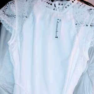 White woman's beautiful lace detailed knee high flowy dress!